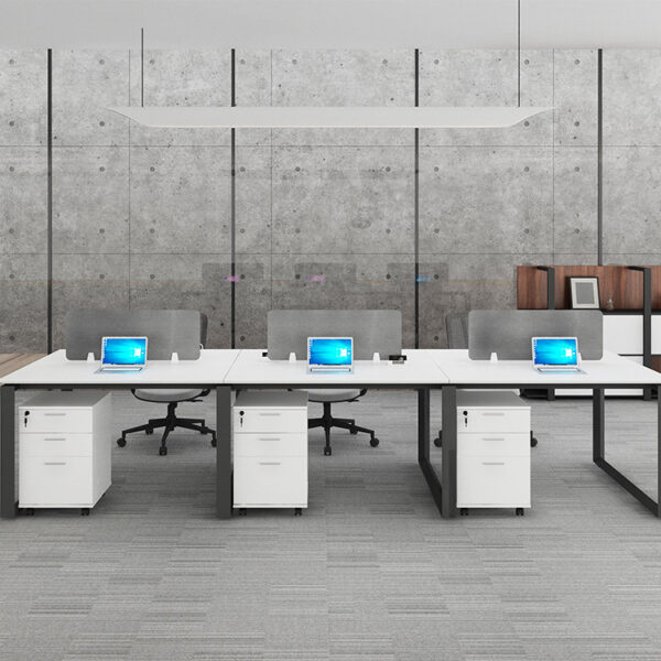 A Universal 6 Seat Workstation with black frame, white tops, and grey screens in an office setting with optional drawer units.