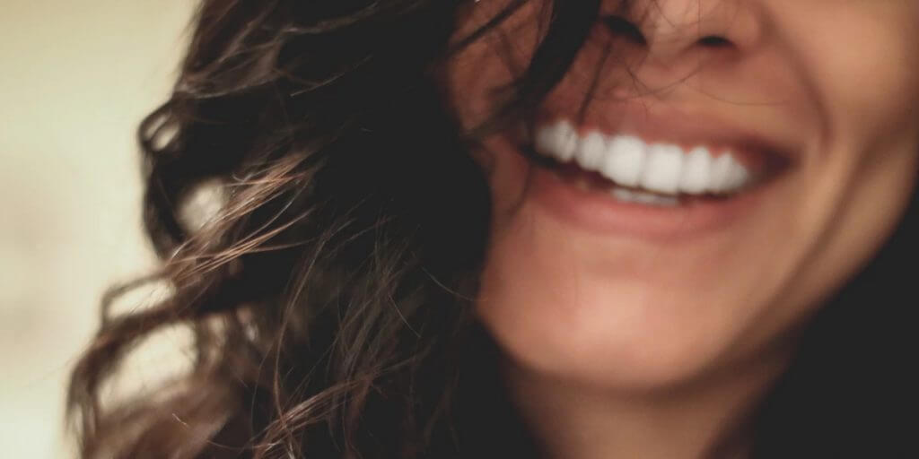 girl-smiling-without-dental-issue