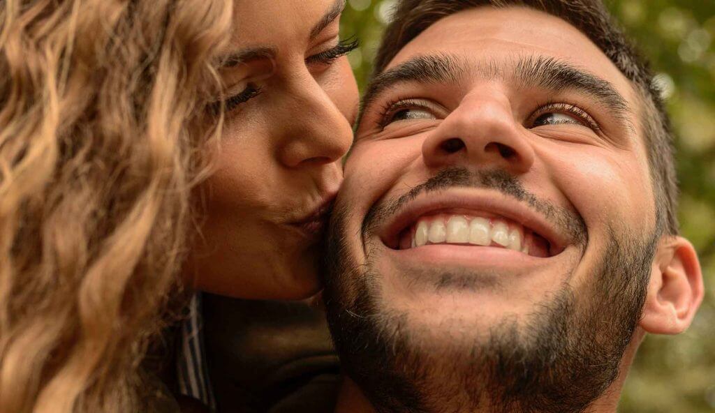 Smiling with a natural slightly yellow smile