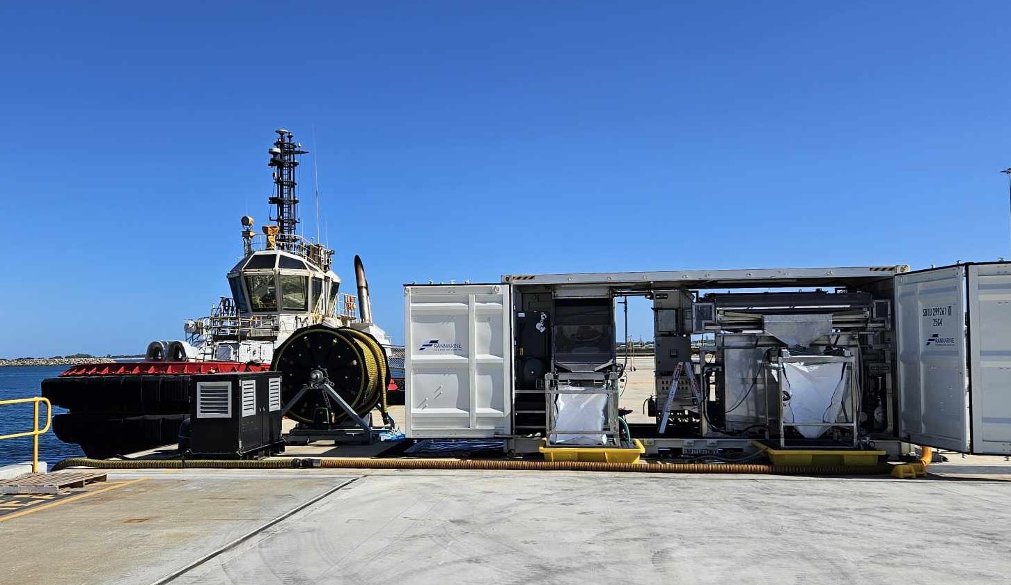 BIOUFOULING MANAGEMENT a shipping container on a dock rigged out as a Franmarine workspace