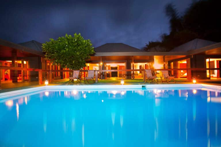 Tavola infinity pool at dusk Luxury Fiji Holiday Residence Island Escapes