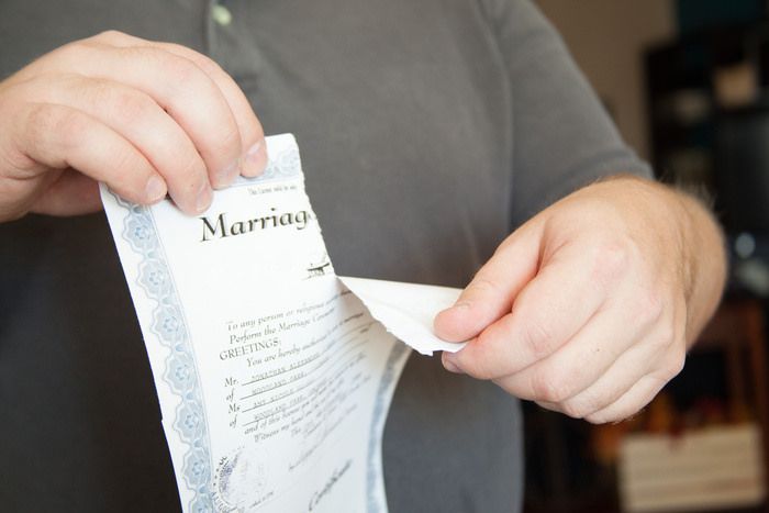 ripping up marriage certificate