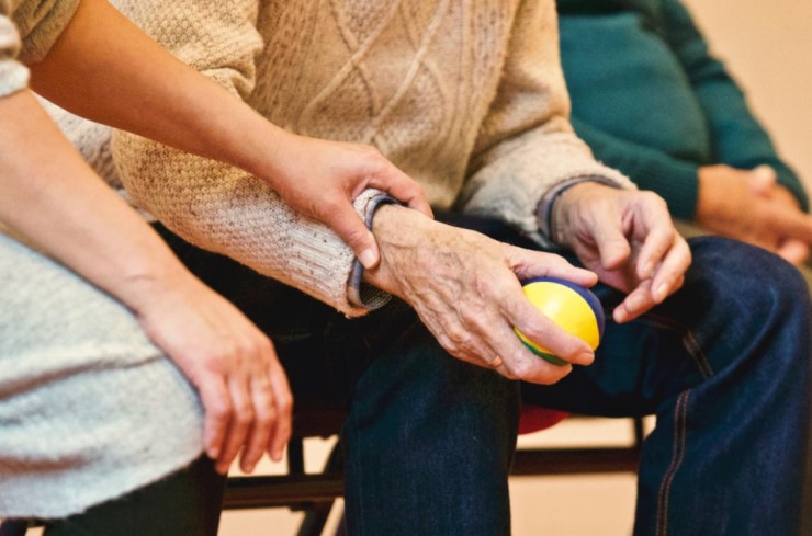 Elderly Person Being Comforted