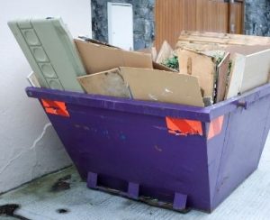 Skip bin hire Adelaide - The Process of Skip Bin Hire in Adelaide: What to Expect - Blue Skip Bin with Garbage Inside