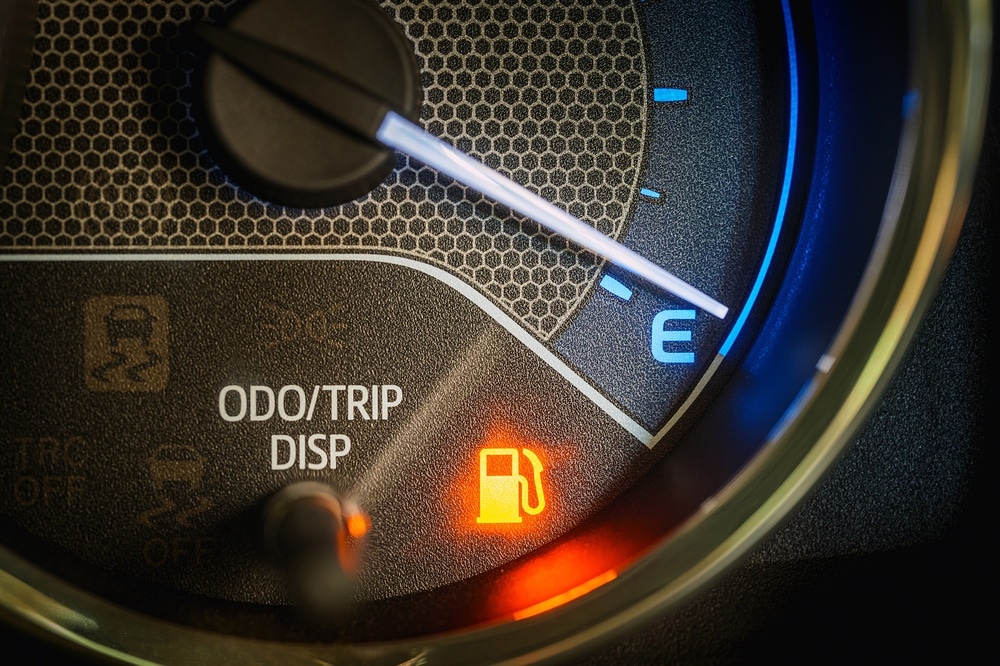 Low Fuel Warning Light on car Dashboard