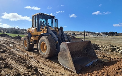 Site cut loader from Paragalli Haulage Canberra and NSW