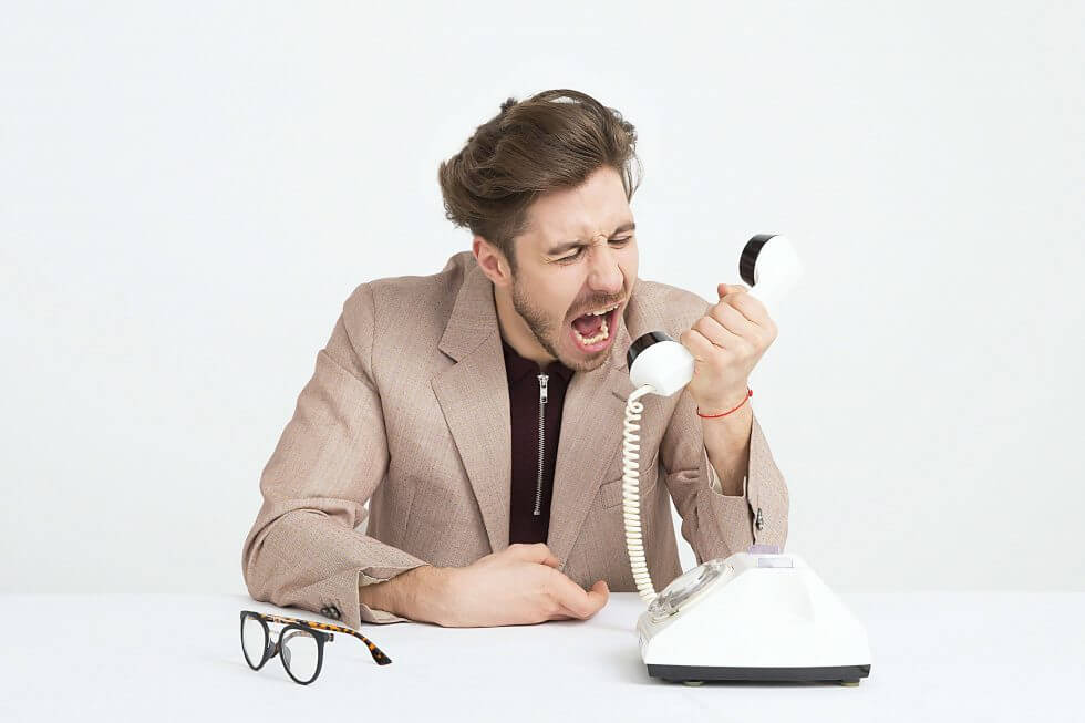 man-yelling-at-the-phone-980x653-1