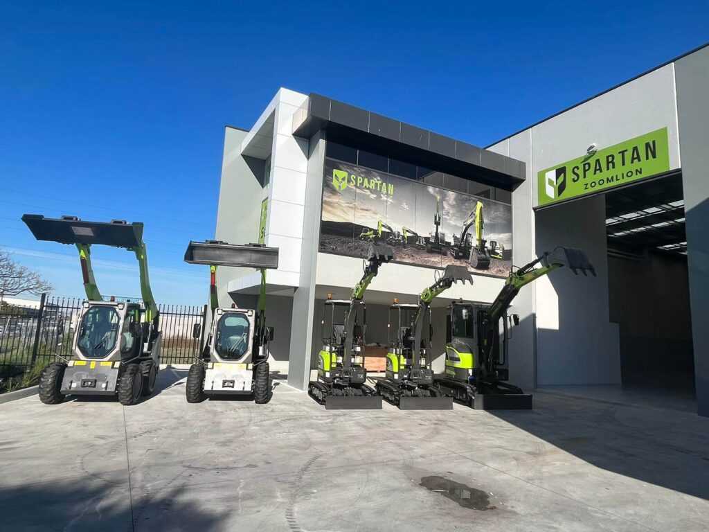 Front view of Spartan dealership with telescopic handlers and excavators | Spartan Machinery