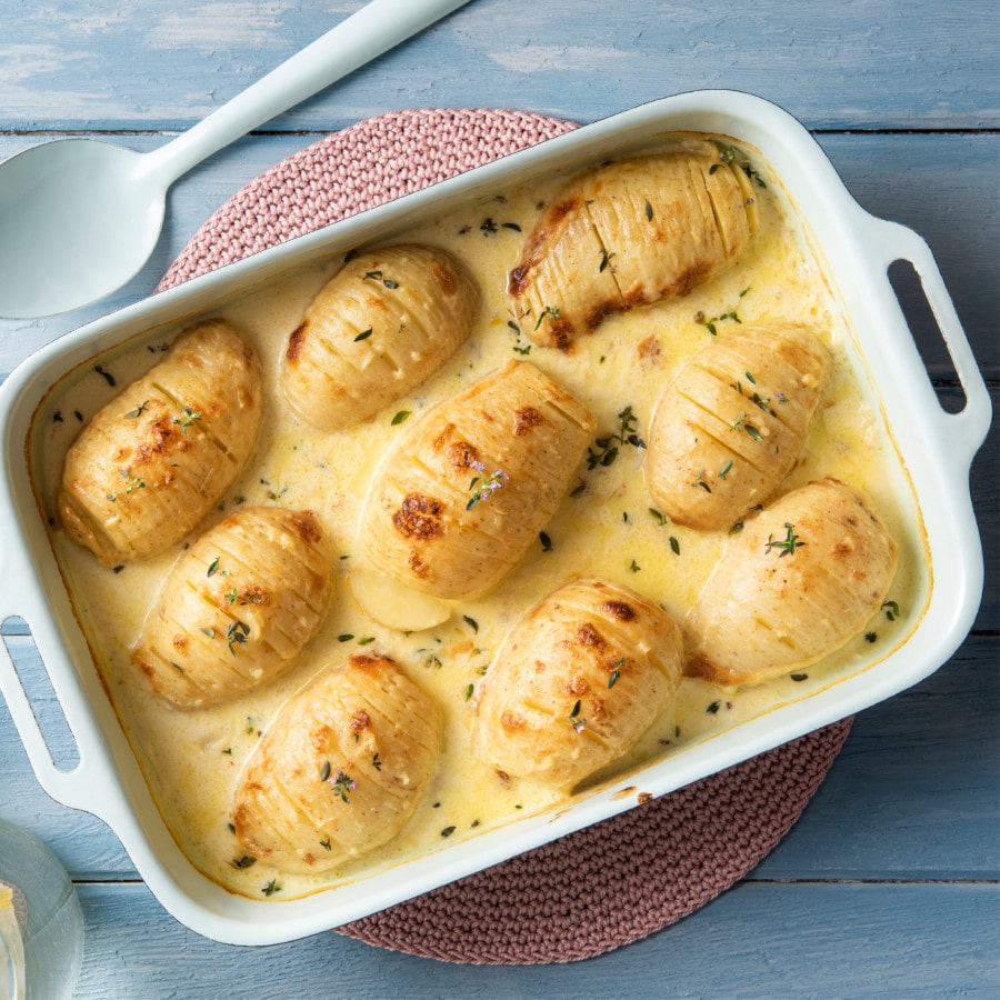 Creamy Cheese and Garlic Hasselback Potato Bake Spudlite