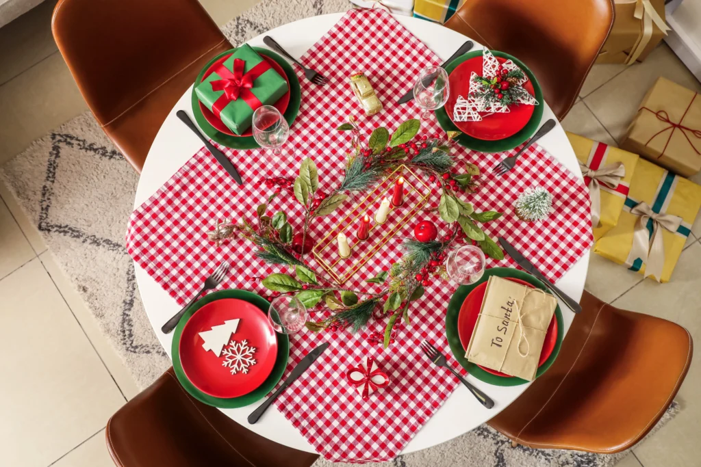 christmas dinner table setup with table cloth and decorations | Swoosh Finance
