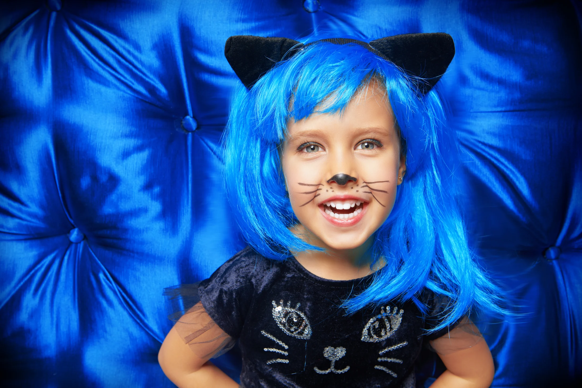 halloween in australia; little girl dressed as cat for halloween | Swoosh Finance