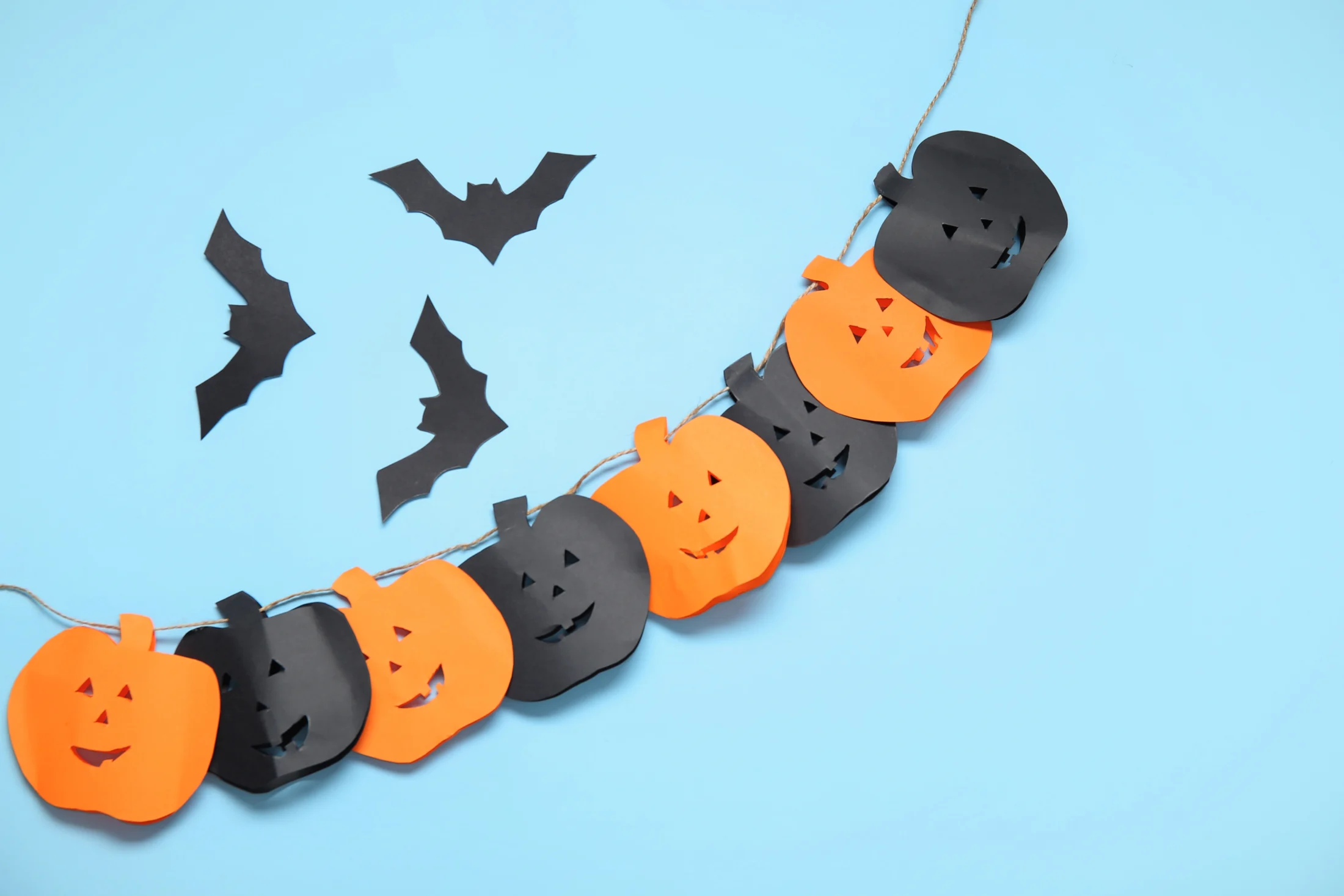halloween in australia; paper pumpkin garland decoration for halloween | Swoosh Finance