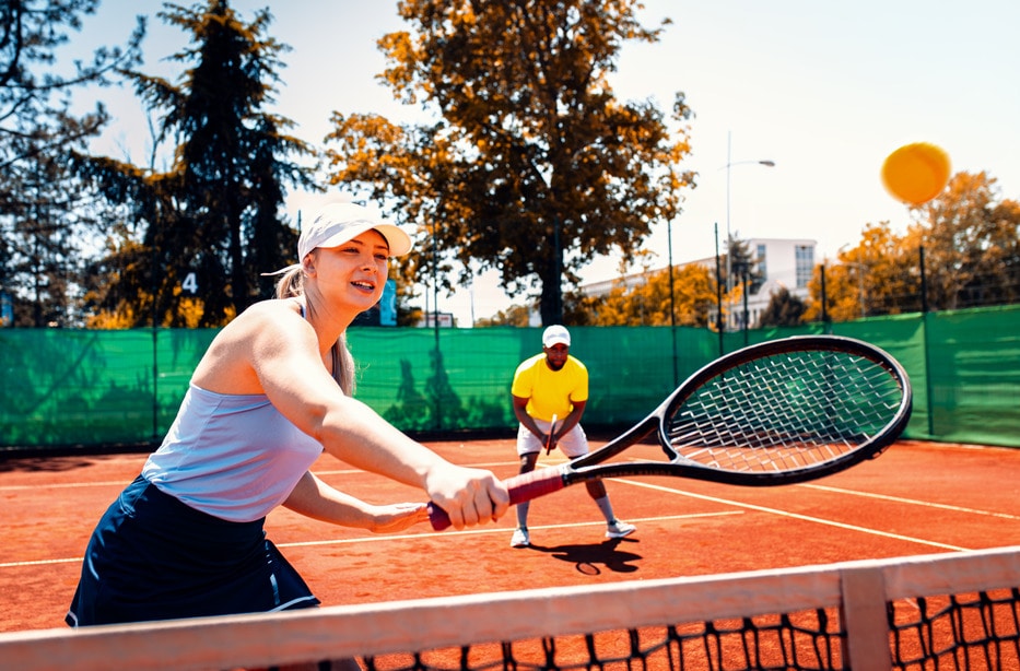 couple-playing-recreational-tennis-on-a-clay-court-2024-05-10-05-17-35-utc (1)